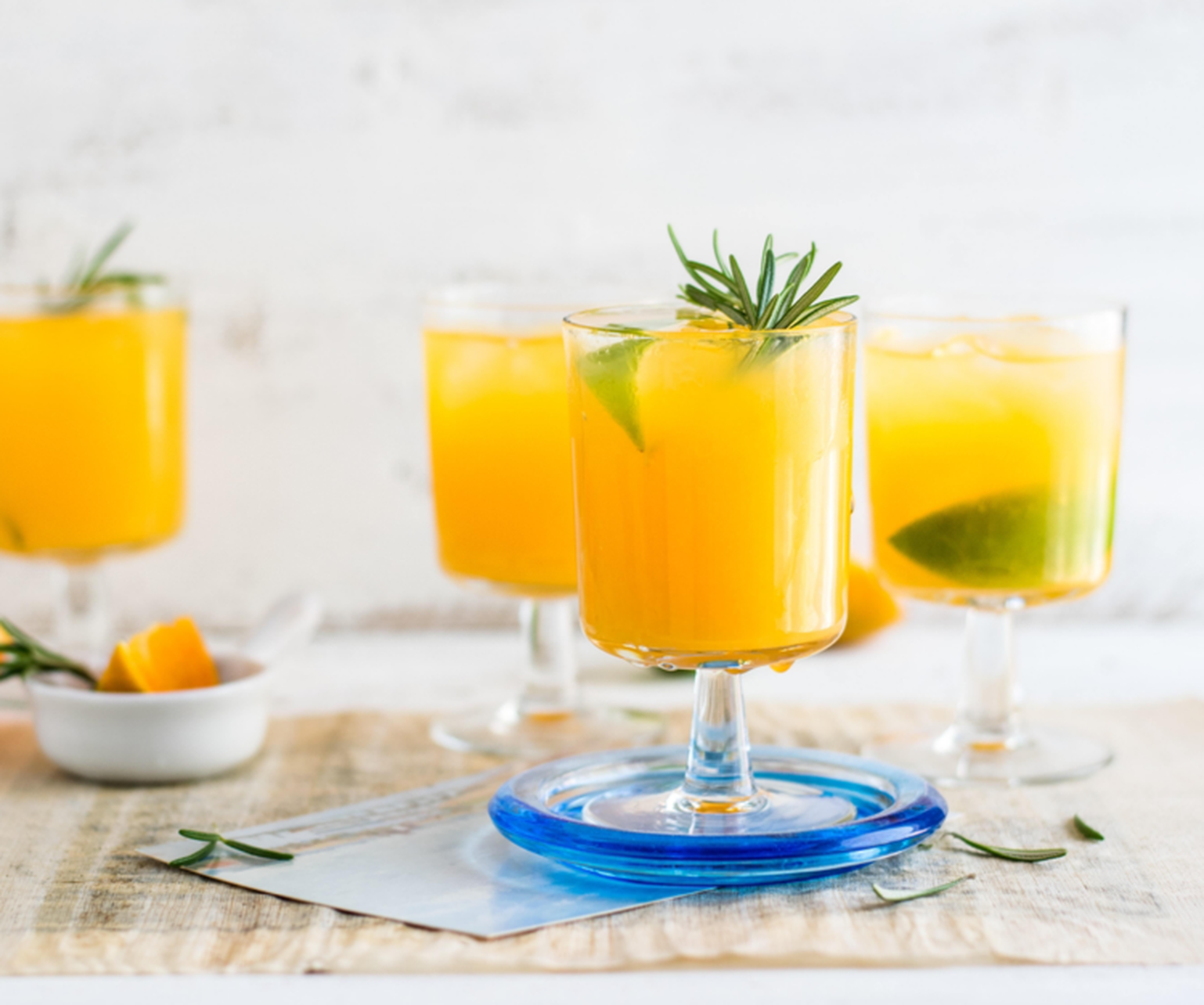 Image of four mimosa cocktails